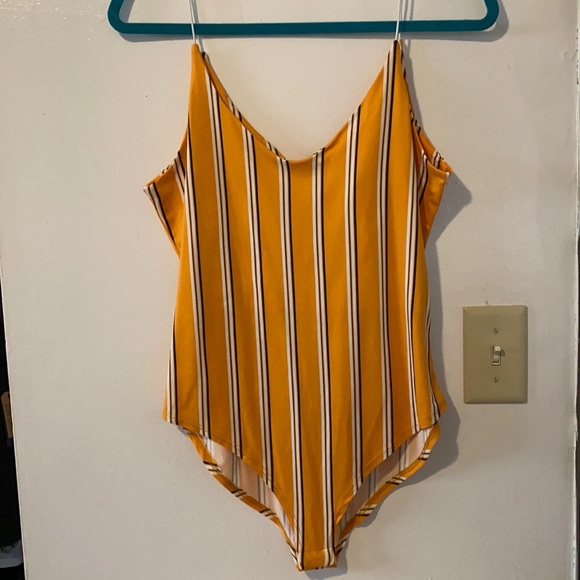 Never worn striped bodysuit. - Picture 1 of 2